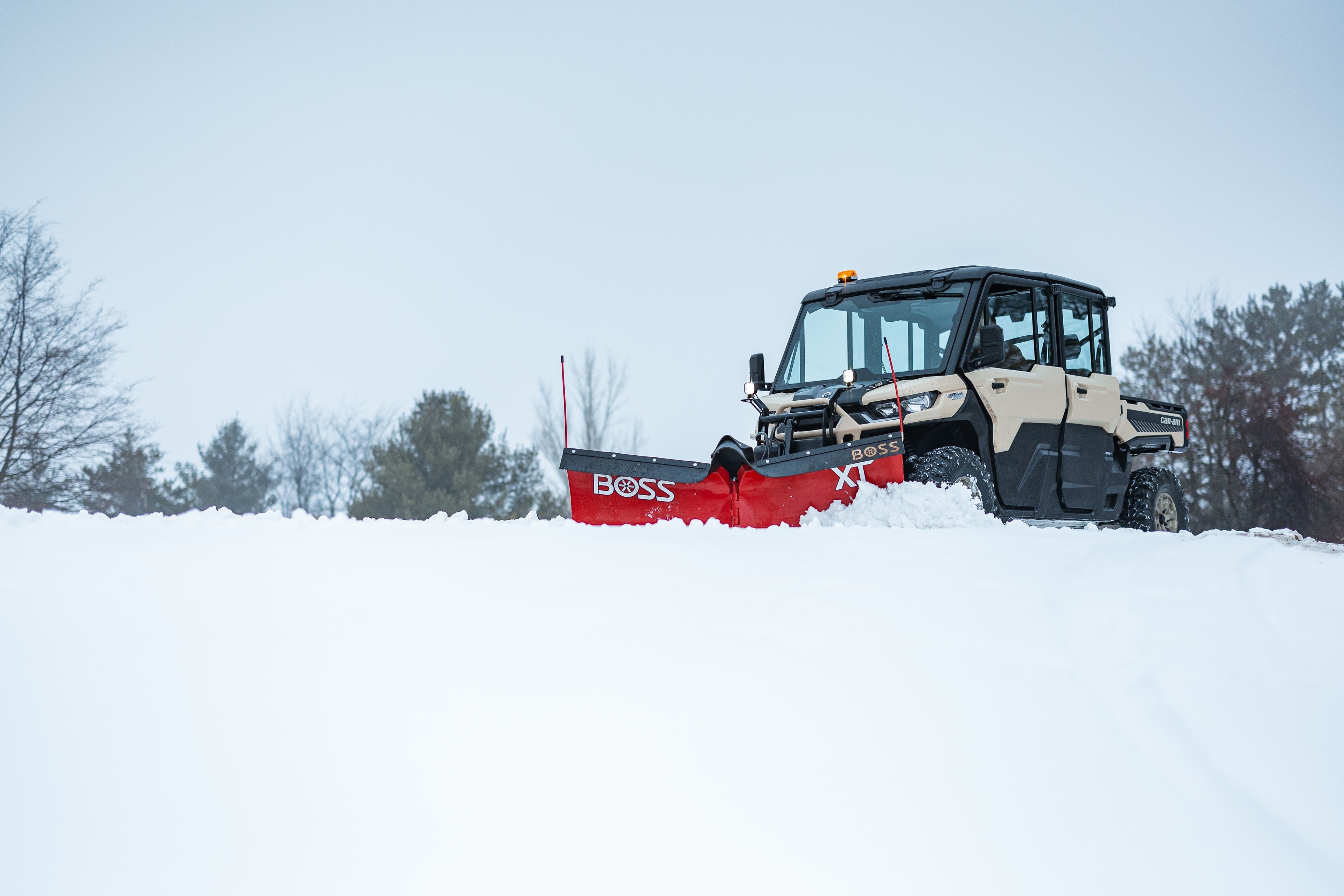 BOSS ATV/UTV compact vehicle equipment in action
