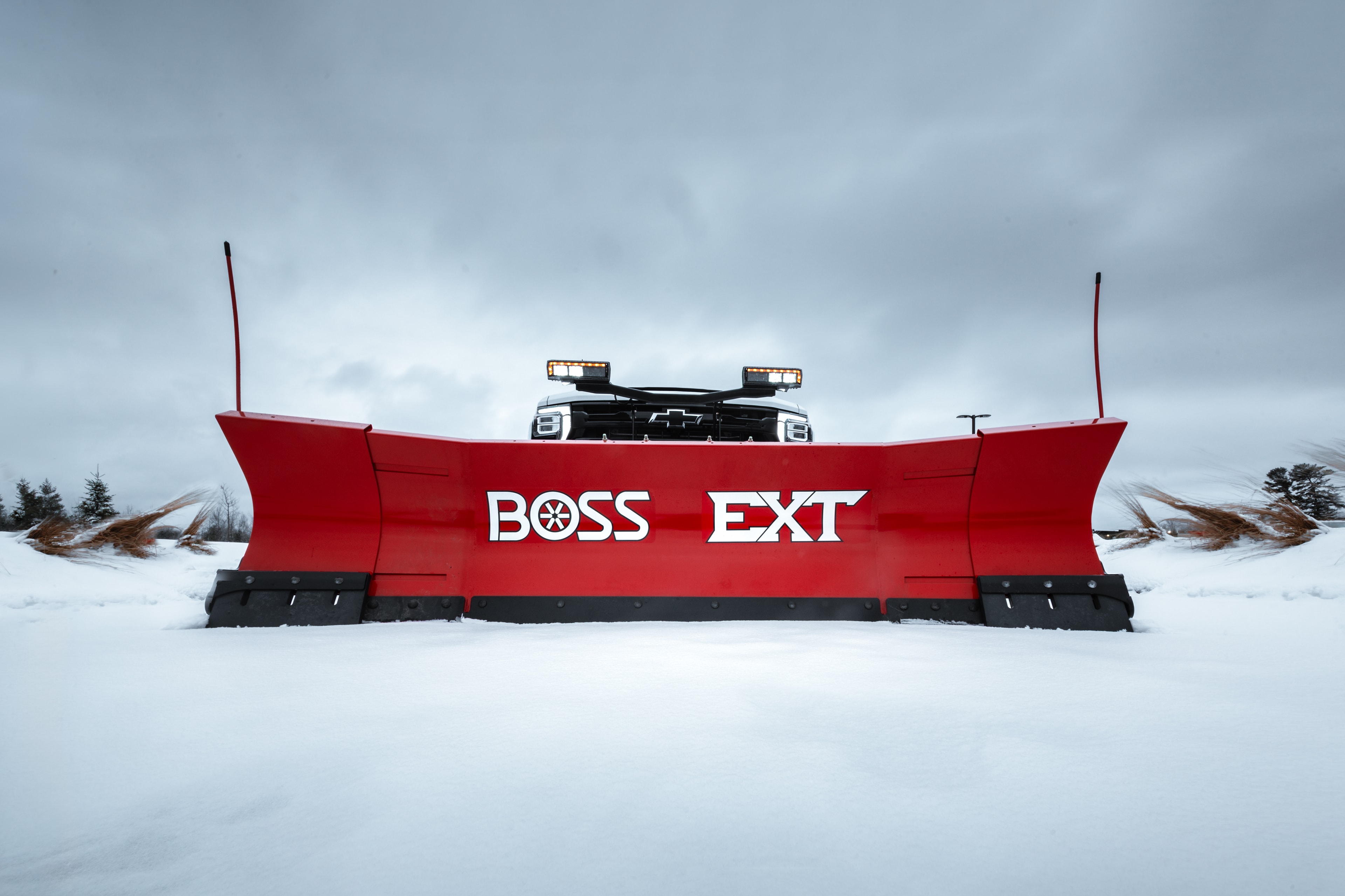 BOSS EXT 8' to 10' expandable snow plow on pickup truck